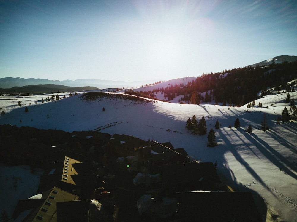 snow covered field during daytime