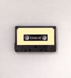 photo of black and brown cassette tape