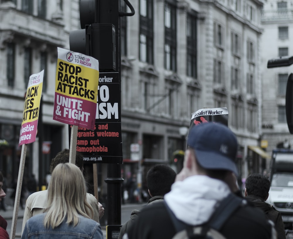 shallow focus photo of protesting people