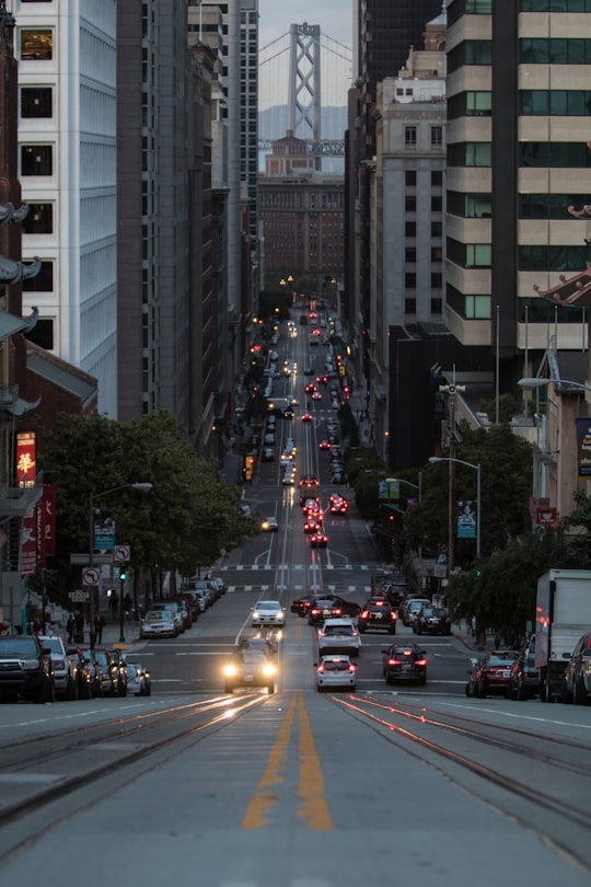 photo of roadway between buildings in San Francisco cable car system United States