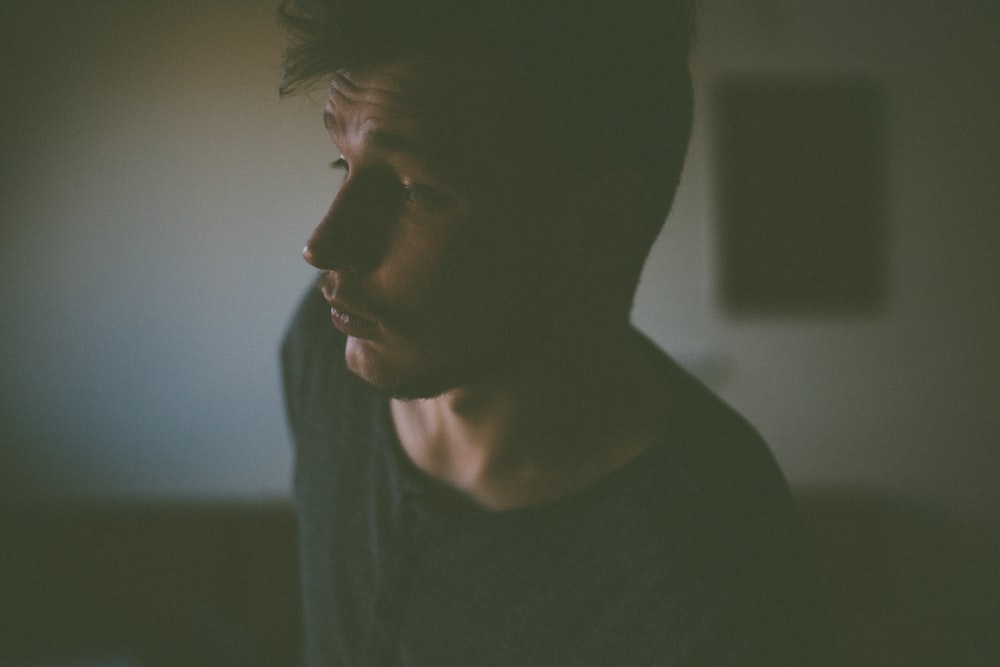 man in black shirt inside room