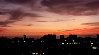 A city skyline at sunset, hinting at growth and the horizon of new opportunities.