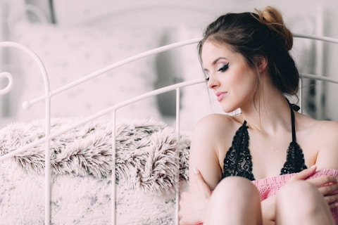 woman wearing black lingerie onlyfans