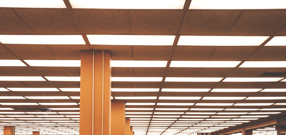 white window blinds on brown wooden frame