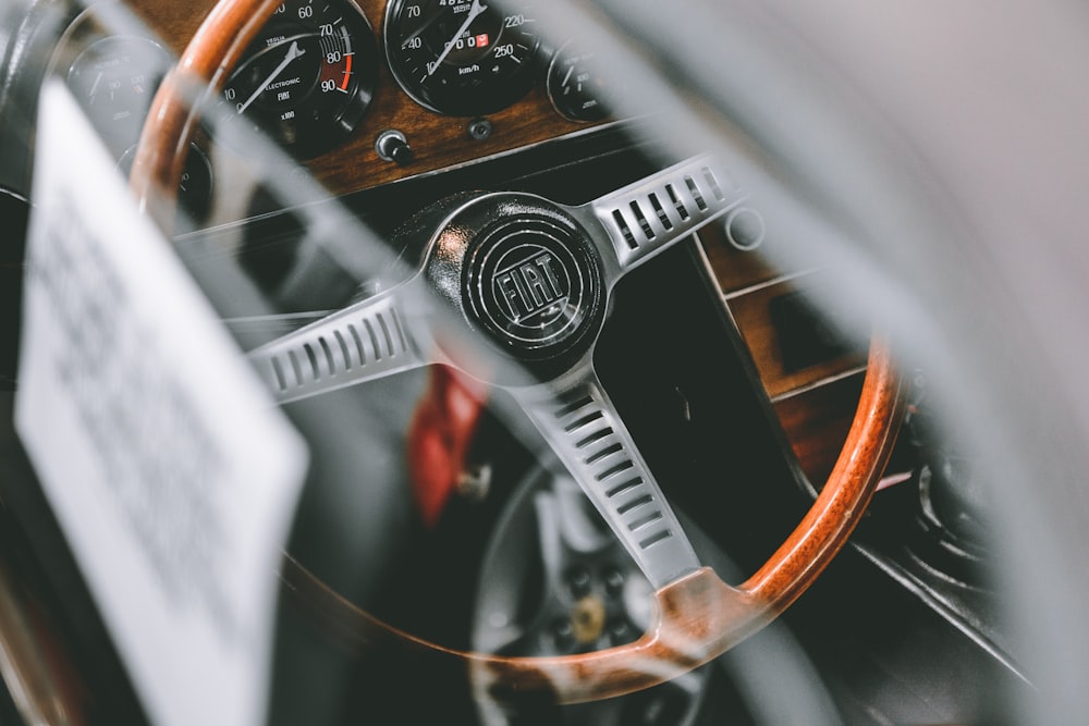 black and grey FIAT car steering wheel