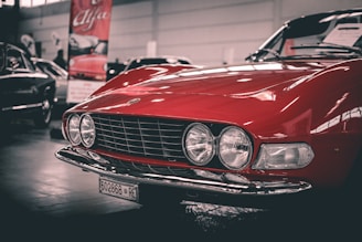 shallow focus photo of red car