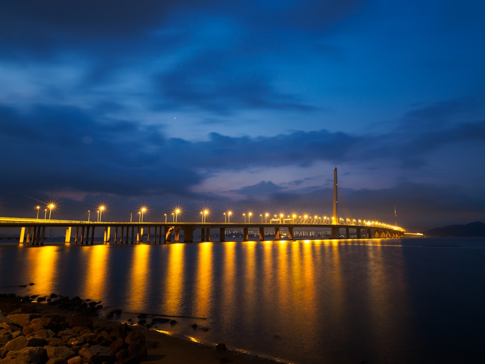 lighted sea bridge above water