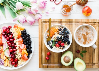 A close-up of a gourmet breakfast plate featuring fresh fruits.