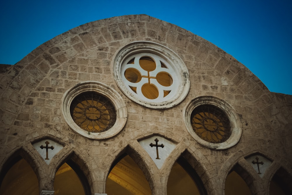 A closeup of the top of a large church.