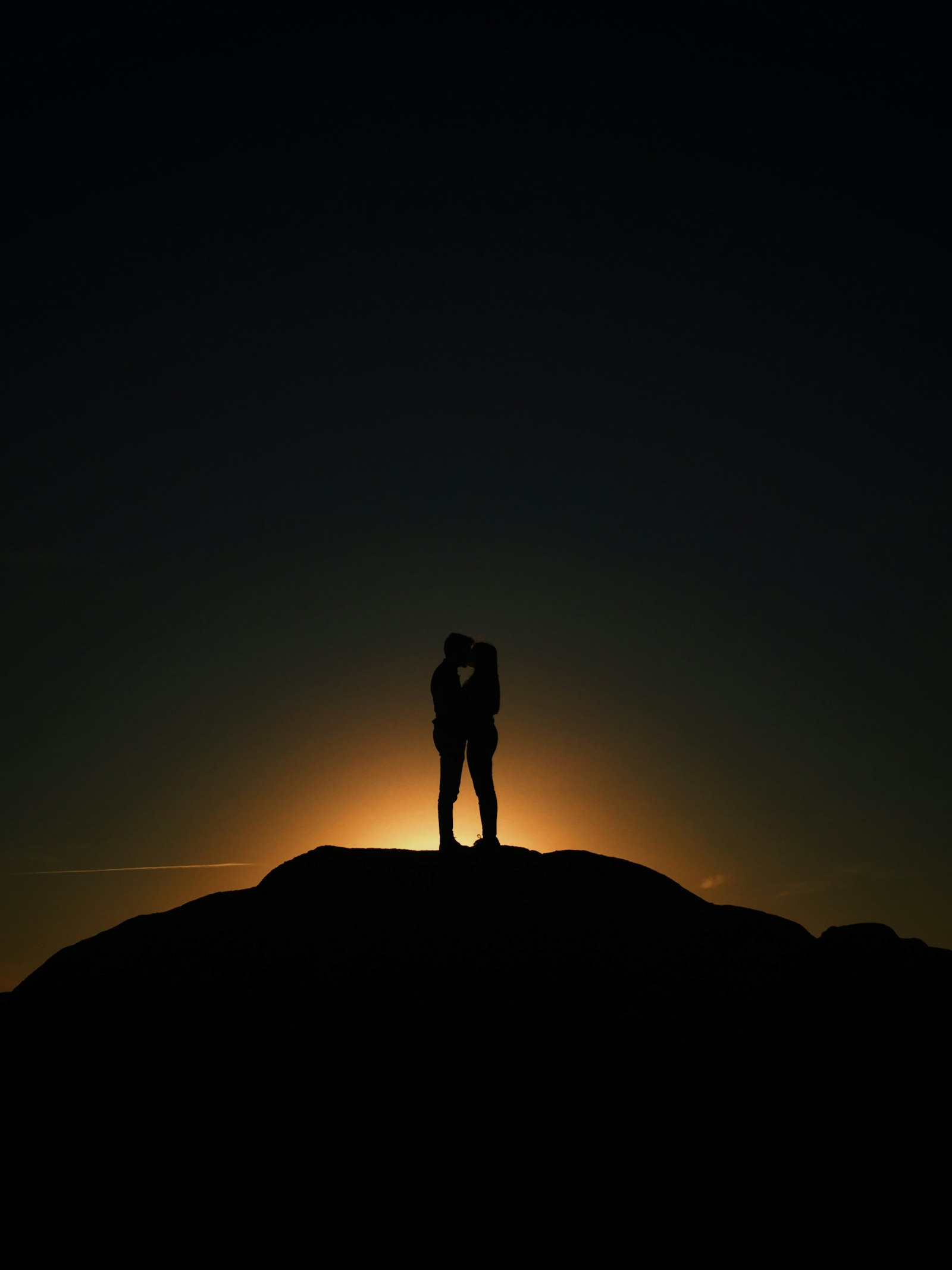 Apple iPhone sample photo. Man and woman kissing photography