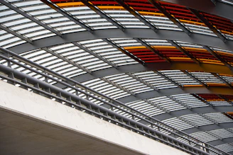 Custom-made metal canopy over a commercial storefront, blending function and style.