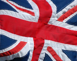 A panoramic view of the UK map subtly overlaid with burgundy and gold accents.