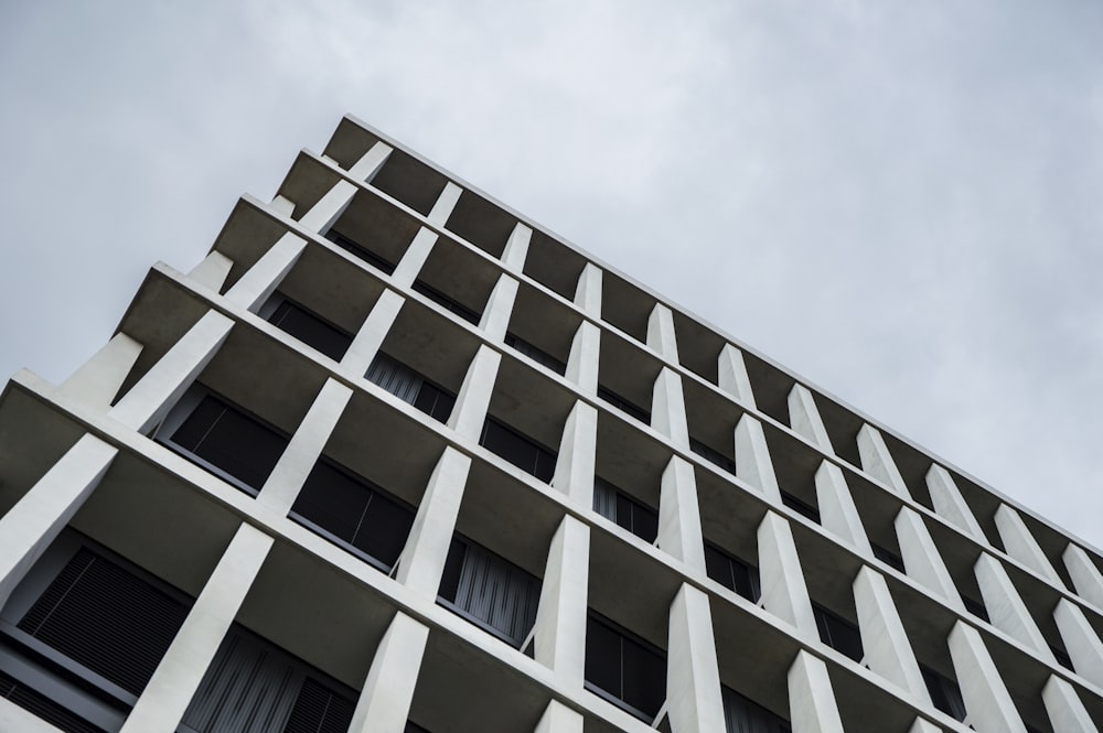 worm's eye view of white concrete building