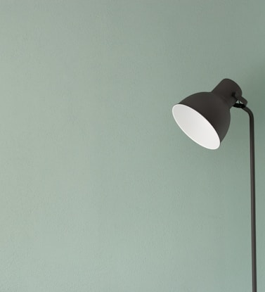 black floor lamp at the corner