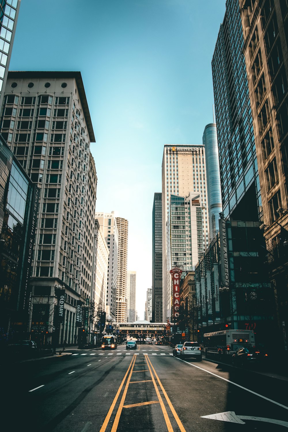 photography of road besides buildings during daytime