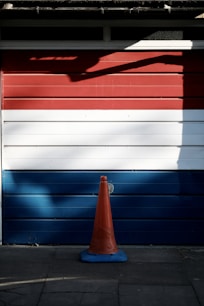 red, white , and blue wooden garage door