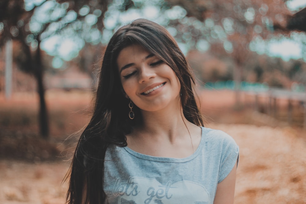 woman in grey top