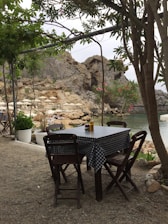 A serene outdoor dining area with a beautiful view, perfect for guests to enjoy.