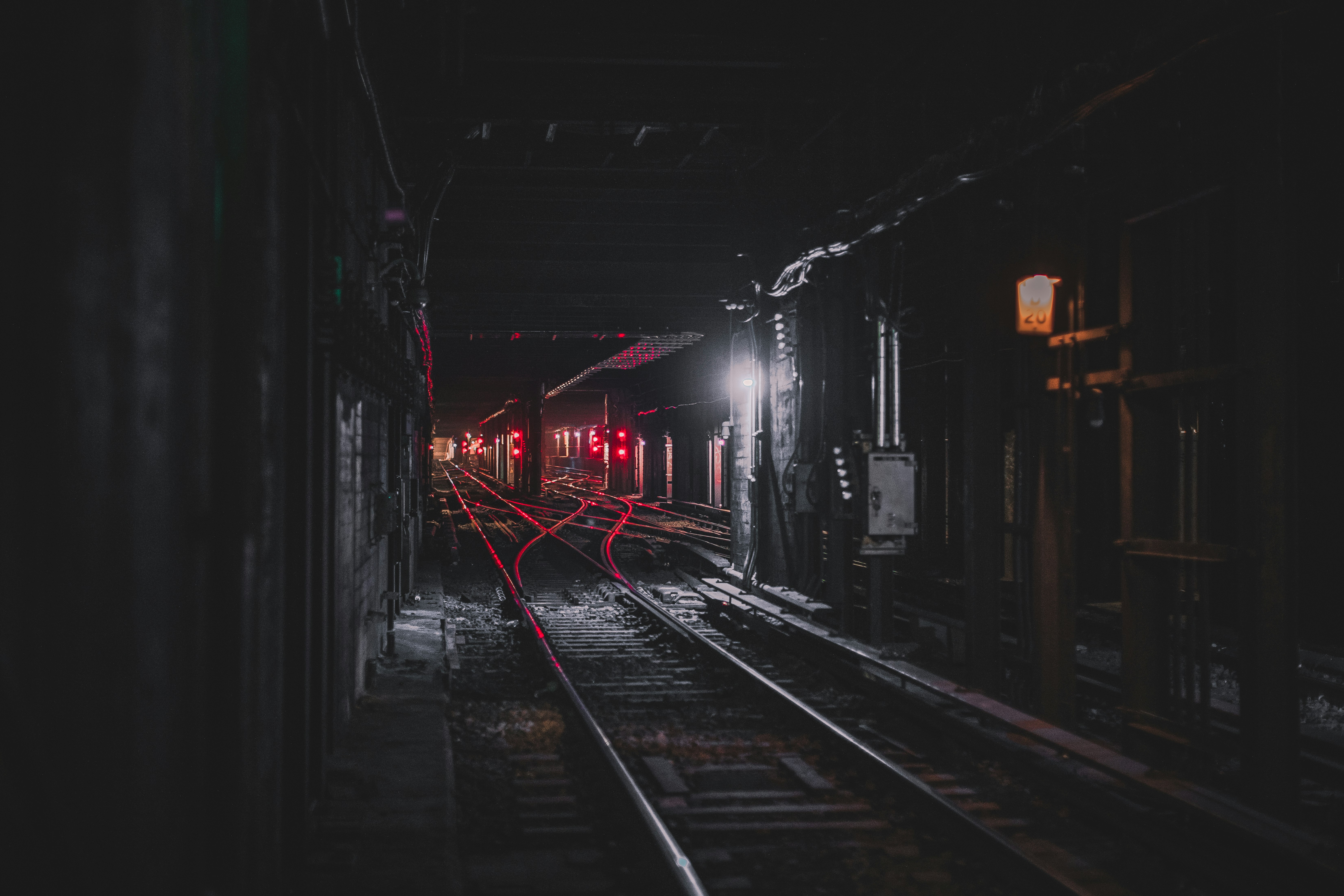 photography of railroad during nighttime