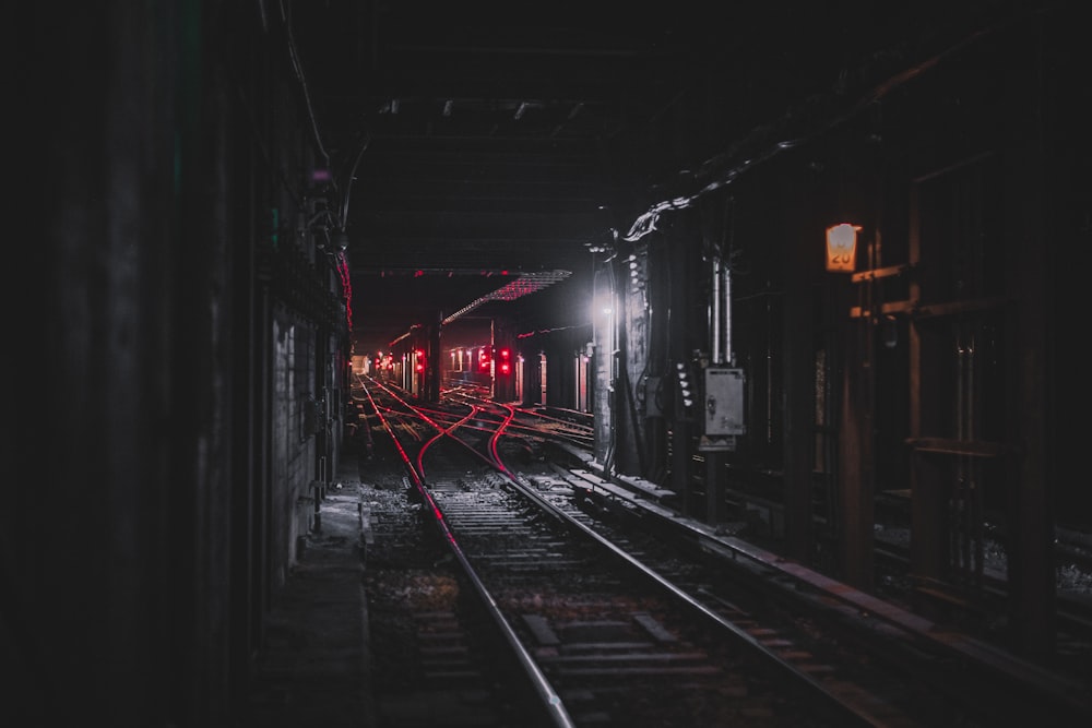 photography of railroad during nighttime