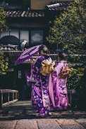 two women in purple and pink kimono