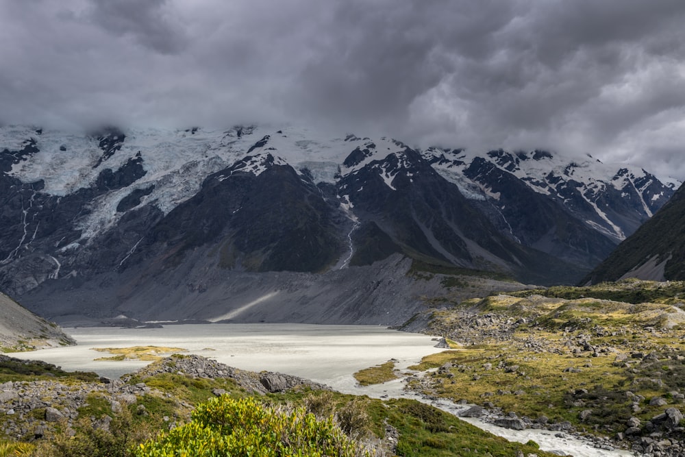 landscape photography of mountain under cloudy sky during daytime