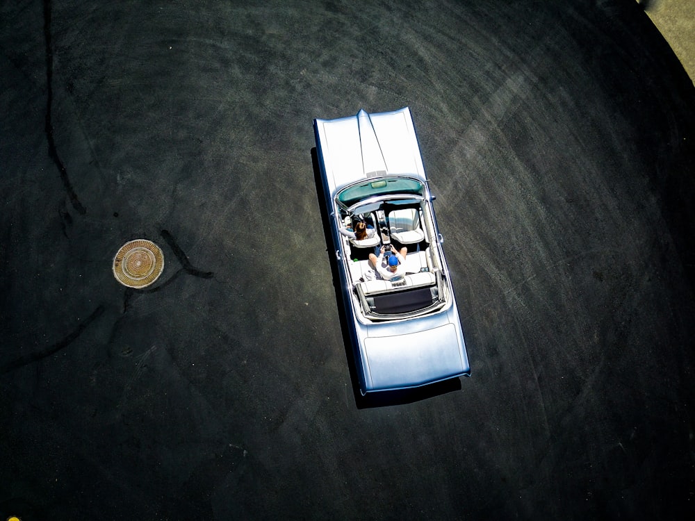toy car near coin on table top