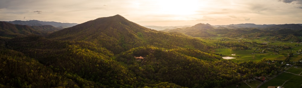 birds eye photography of green mountain