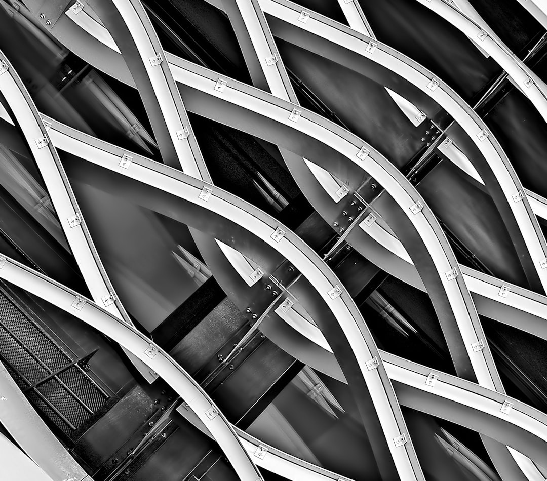 minimalist photography of spiral structure, Steel waves