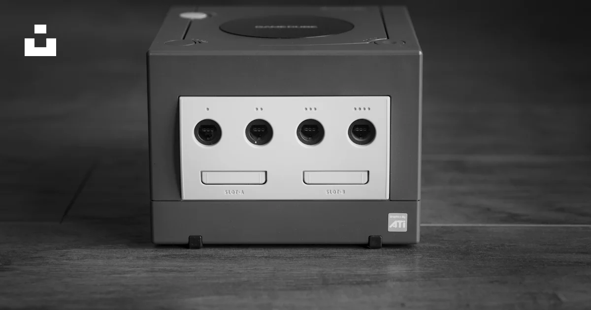 White and black Nintendo GameCube on gray surface photo – Free Grey ...