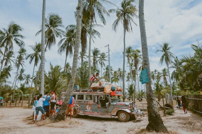 man on top of jeepny philippines teams background