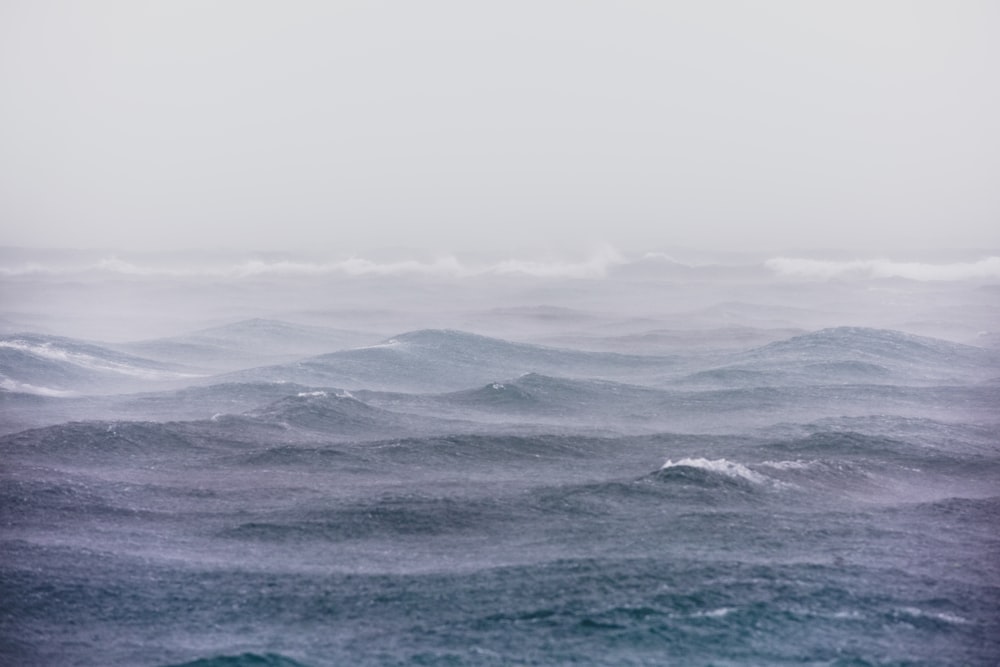 body of water under stratocumulus clouds