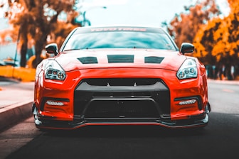 red car near trees