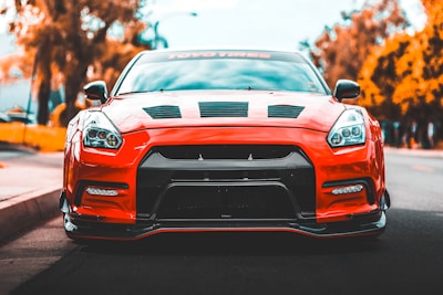 red car near trees