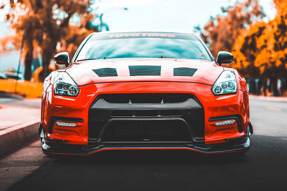 red car near trees