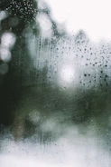 a window with rain drops on it