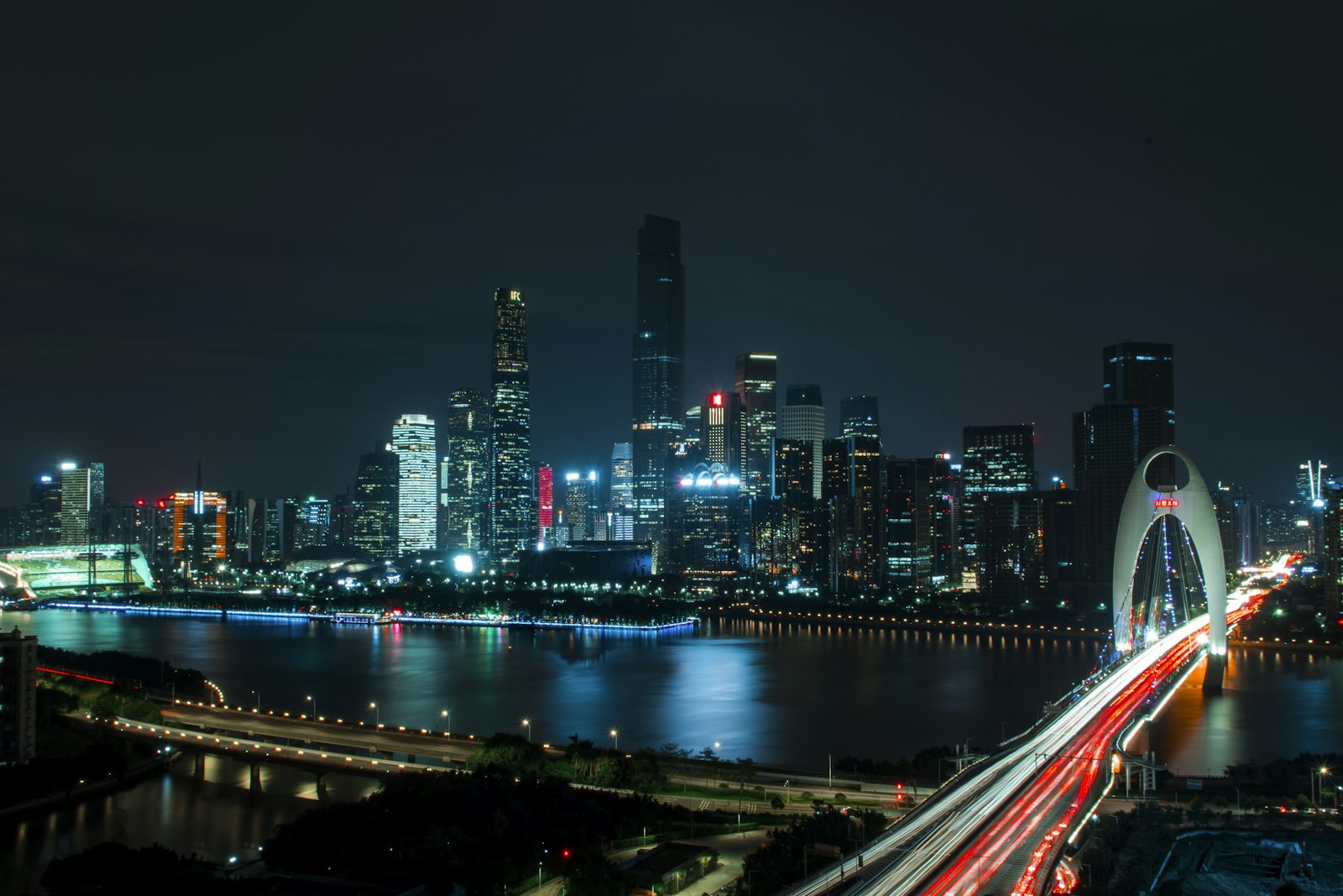Landscape photography of bridge near high-rise buildings
