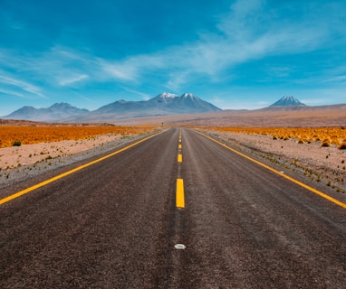 lone road going to mountains