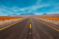 lone road going to mountains