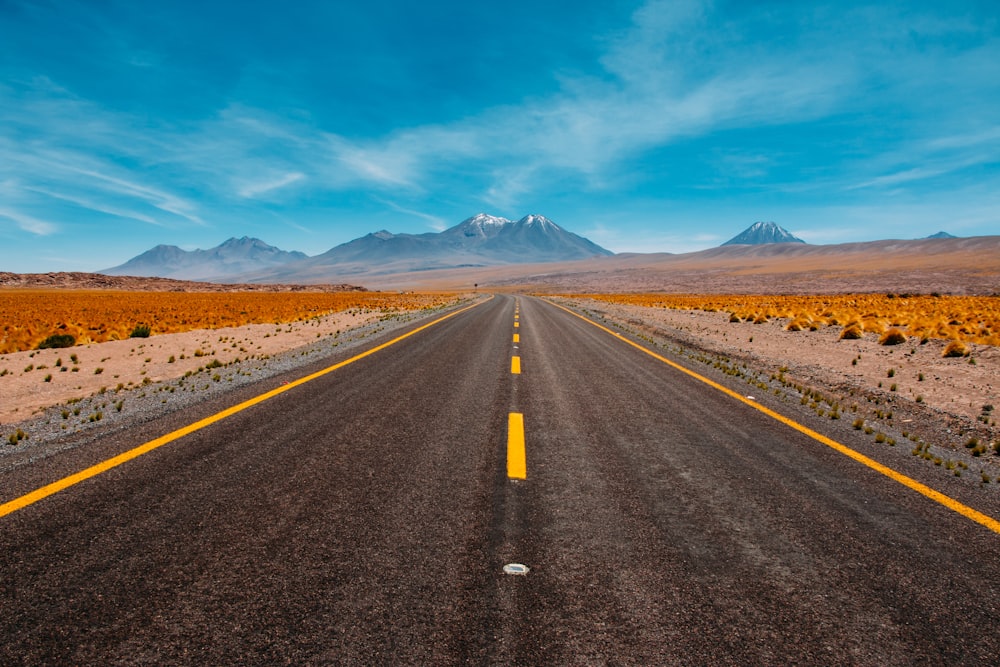 lone road going to mountains TWO WHEELER SAFETY