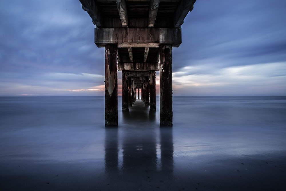 dock bridge near body of water