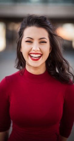 closeup photography of woman smiling