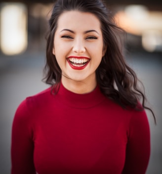 closeup photography of woman smiling