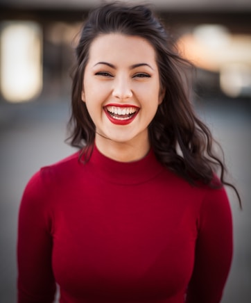 closeup photography of woman smiling