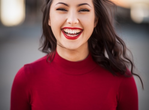 closeup photography of woman smiling onlyfans