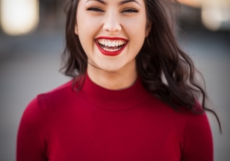 closeup photography of woman smiling