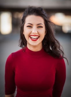 closeup photography of woman smiling