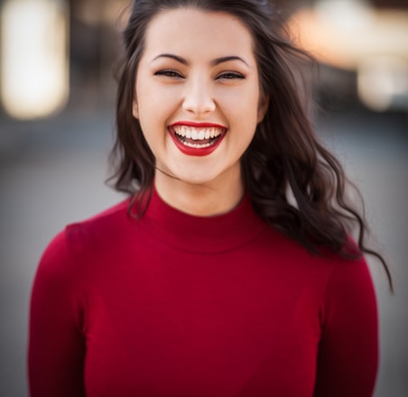 closeup photography of woman smiling