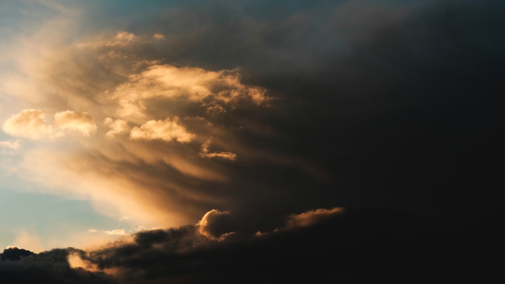 cumulus clouds during golden hour