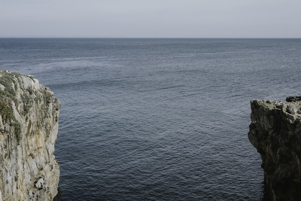 water between cliffs